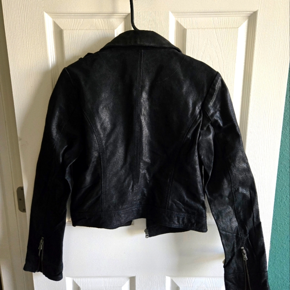 Black, suede leather coat. Size small. Brand is Levi. Great condition.